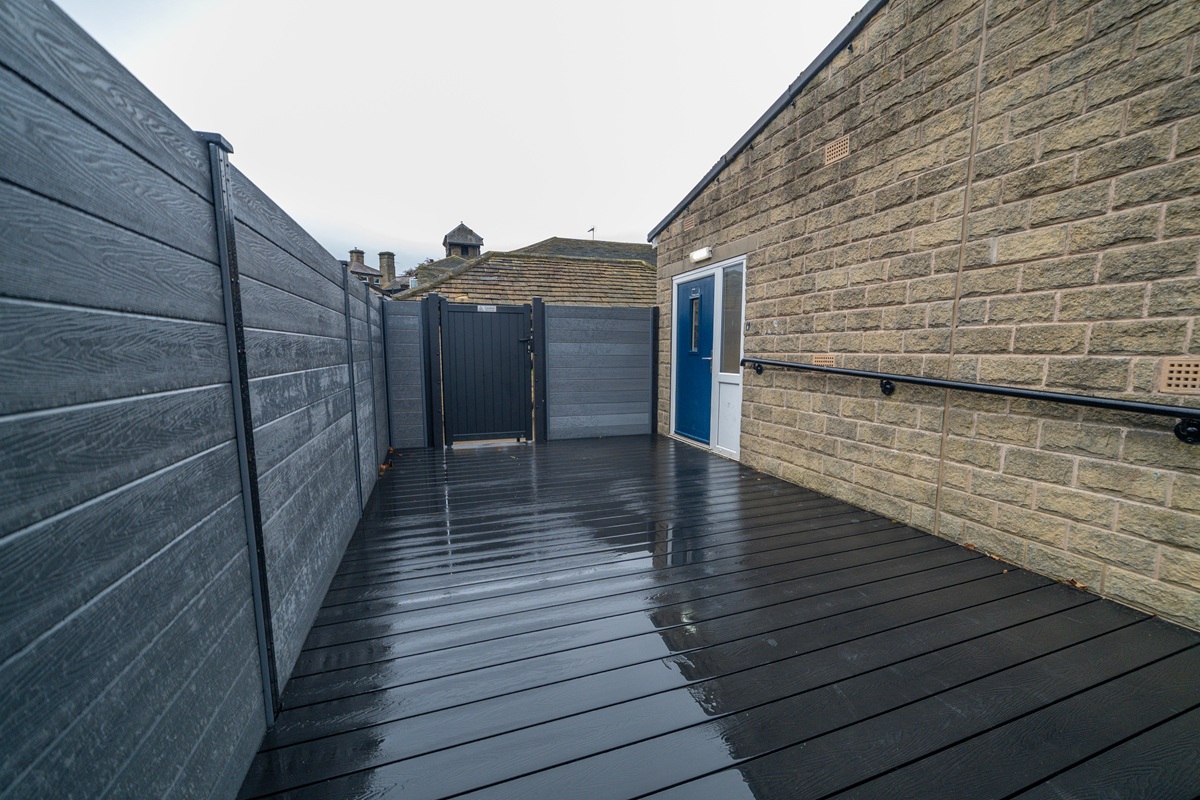 dark grey decking with grey fencing