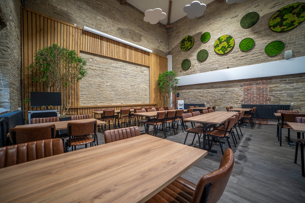neutral dining area with wooden tables